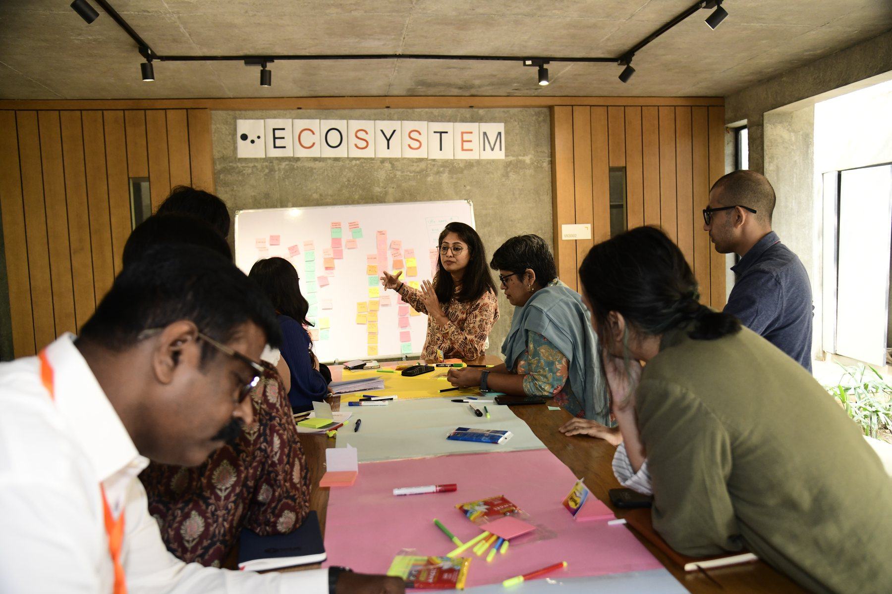 Participants discussing the workforce index ecosystem with sticky notes